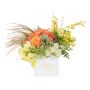 Florals of mixed textures and colors make this arrangement a perfect expression of spring