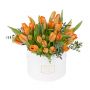 Tulips, the promising flower of spring, making a statement in round box