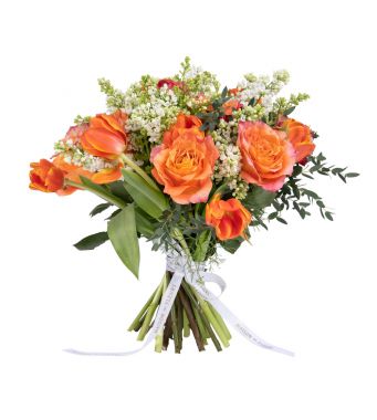 Gorgeous tulips and fragrant garden roses take center stage in this exquisite spring bouquet