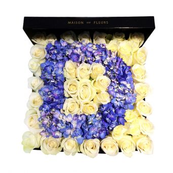 White Roses and letters in blue hydrangeas flowers in mdf black square box