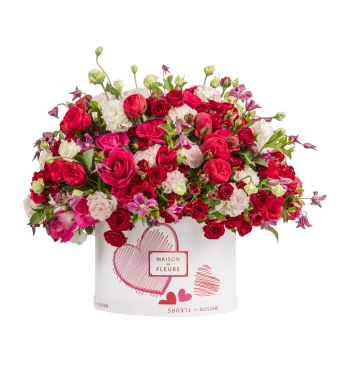Luxurious limited edition 40 cm round Valentine’s box designed with a mix of our premium roses and flowers